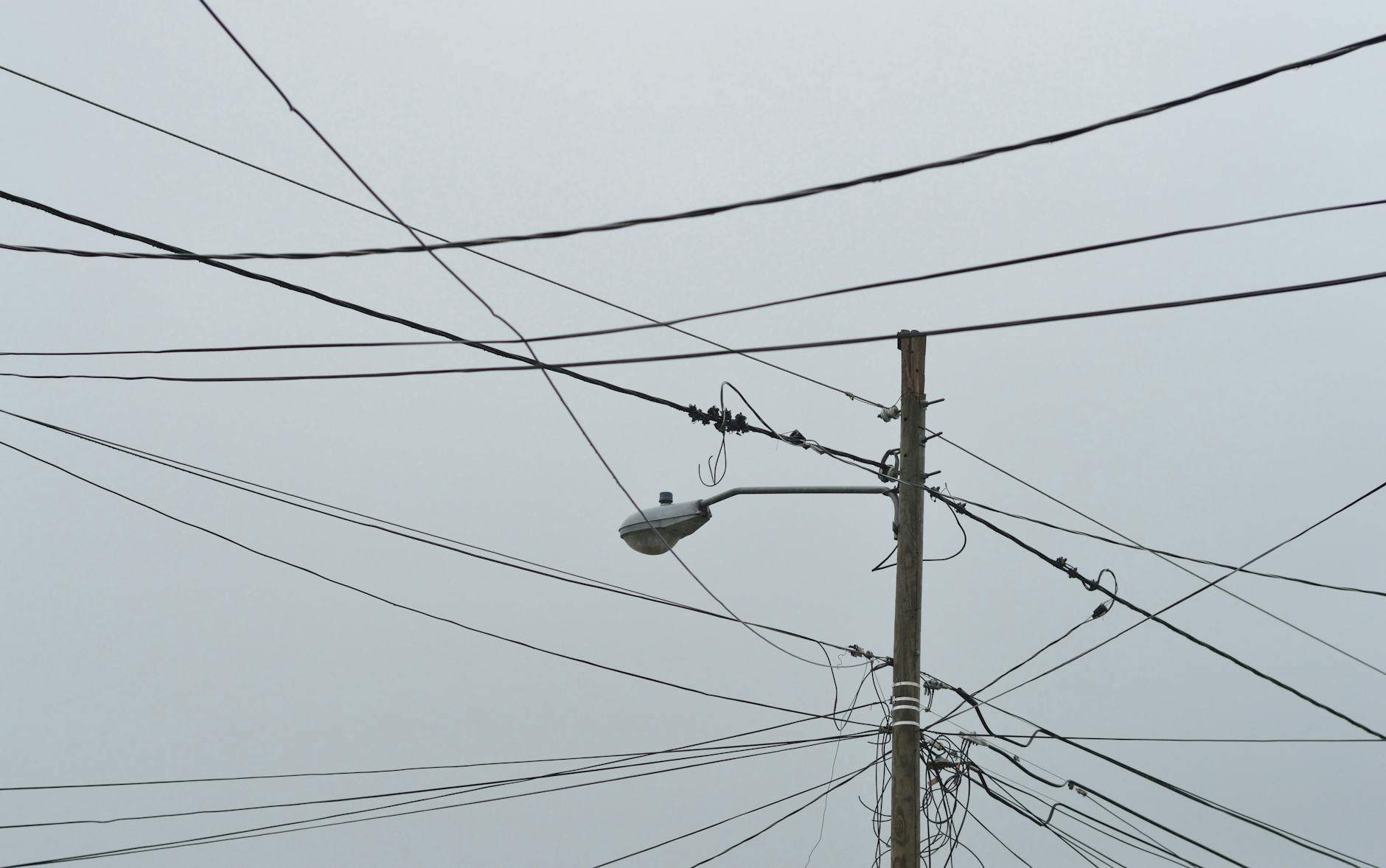 gray electric post with light